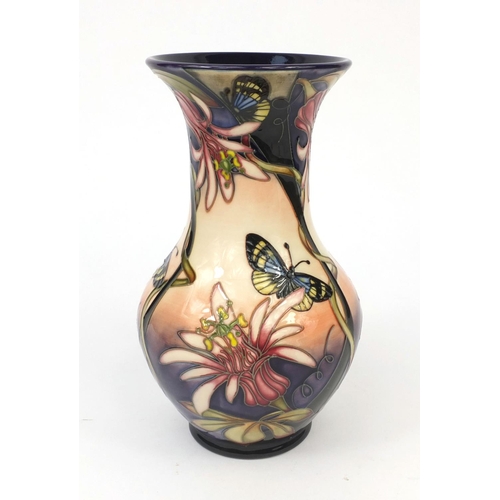 2062 - Boxed limited edition Moorcroft pottery longwing patterned vase, design by Siam Leeper, factory mark... 