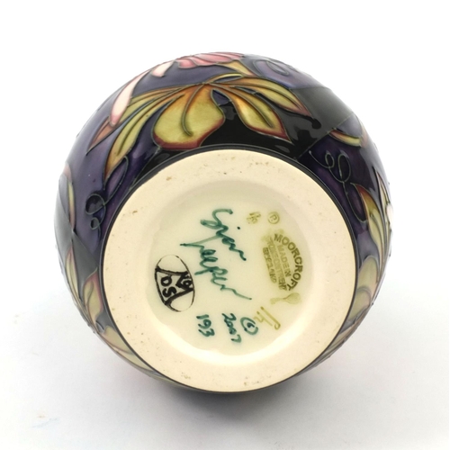 2062 - Boxed limited edition Moorcroft pottery longwing patterned vase, design by Siam Leeper, factory mark... 