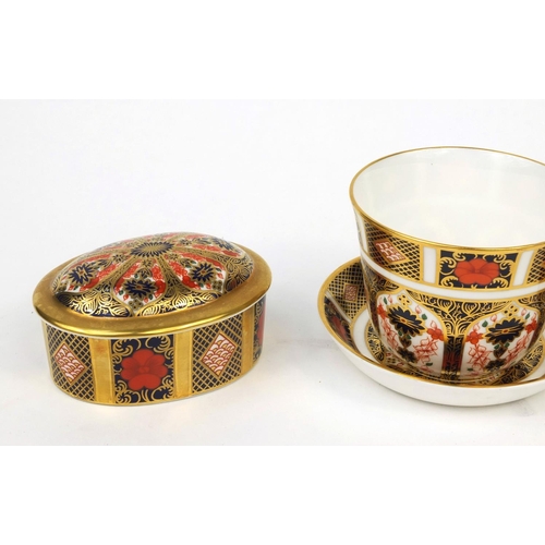 2050 - Group of Royal Crown Derby Imari patterned porcelain comprising two trinkets and a cup and saucer, t... 