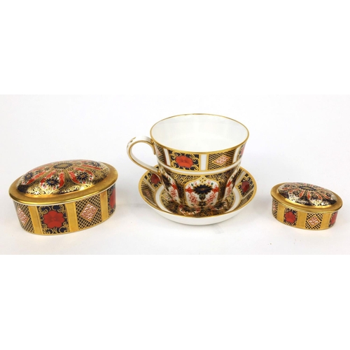 2050 - Group of Royal Crown Derby Imari patterned porcelain comprising two trinkets and a cup and saucer, t... 