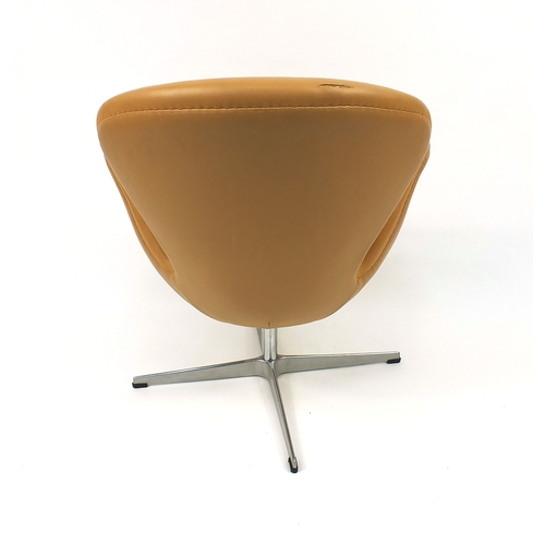 2014 - Arne Jacobsen design swan chair with leather upholstery, 75cm high