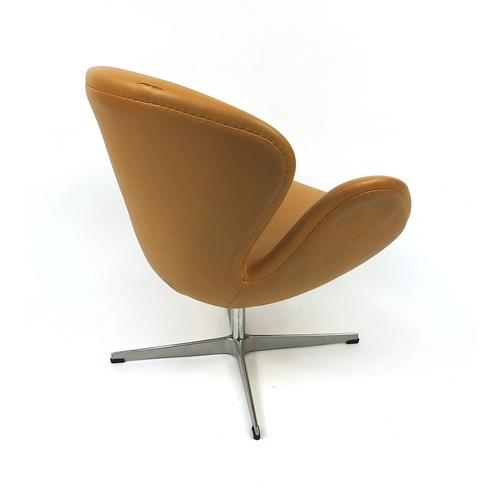 2014 - Arne Jacobsen design swan chair with leather upholstery, 75cm high