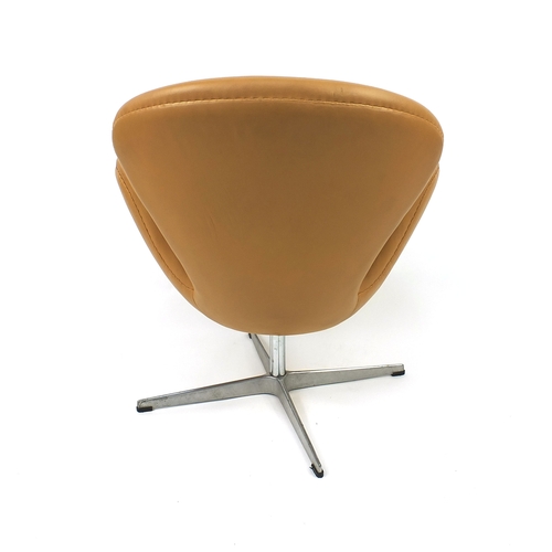 2013 - Arne Jacobsen design swan chair with leather upholstery, 75cm high