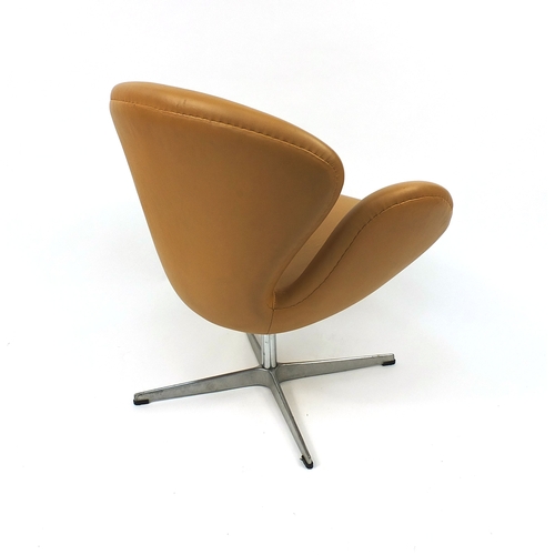 2013 - Arne Jacobsen design swan chair with leather upholstery, 75cm high