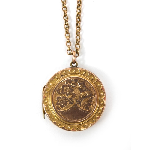 2493 - 9ct gold back and front floral locket engraved with flowers, on chain, approximate weight 9.6g