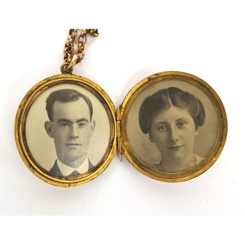 2493 - 9ct gold back and front floral locket engraved with flowers, on chain, approximate weight 9.6g