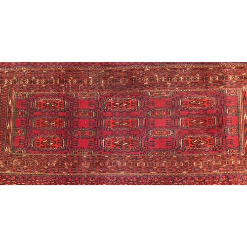 2027 - Rectangular Middle eastern Turkoman rug, the central field and boarders decorated all over with styl... 