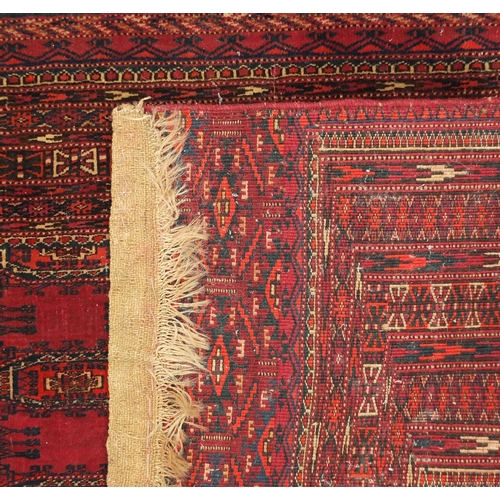 2027 - Rectangular Middle eastern Turkoman rug, the central field and boarders decorated all over with styl... 