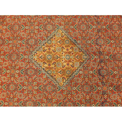 2002 - * DESCRIPTION AMENDED 3/1 * Antique rectangular Persian Tabriz carpet, with an all over herati desig... 