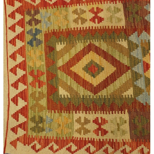 2012 - Rectangular Persian Kilim carpet runner, with an all over geometric design, 302cm x 84cm