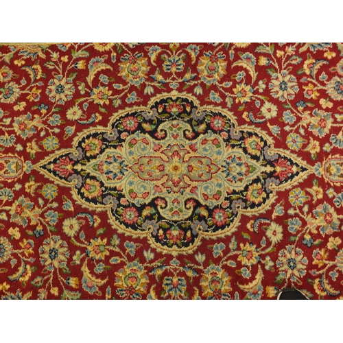 2022 - Large rectangular Persian Kerman carpet runner, the central field and boarders decorated all over wi... 