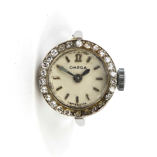 859 - Ladies white metal Omega watch ring, the case set with twenty six diamonds and inscribed 'All Plat',... 