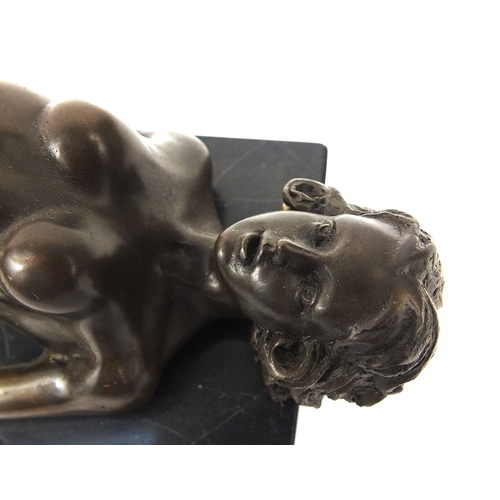 2103A - Bronze model of an erotic reclining nude female on a marble base, 12cm high