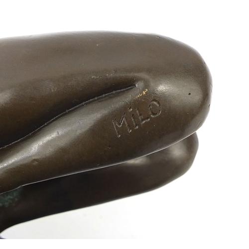 2103A - Bronze model of an erotic reclining nude female on a marble base, 12cm high