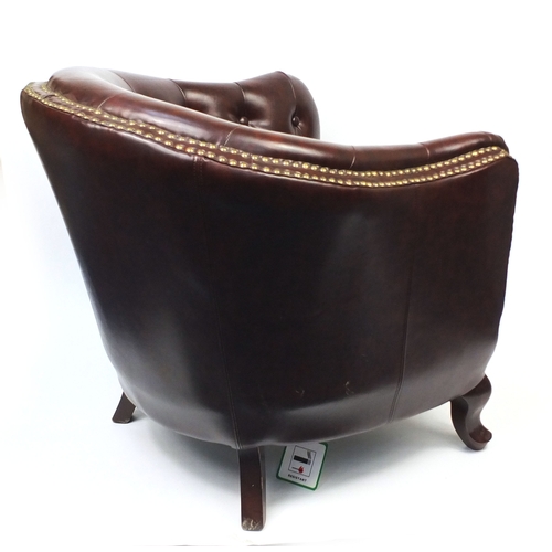 2009A - Pair of brown leather club chairs with horse shoe shaped back and button upholstery, 79cm high