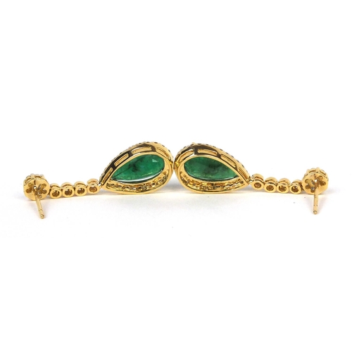 742 - Pair of 18ct gold tear drop emerald and diamond  earrings, approximately 3.6cm long, approximate wei... 