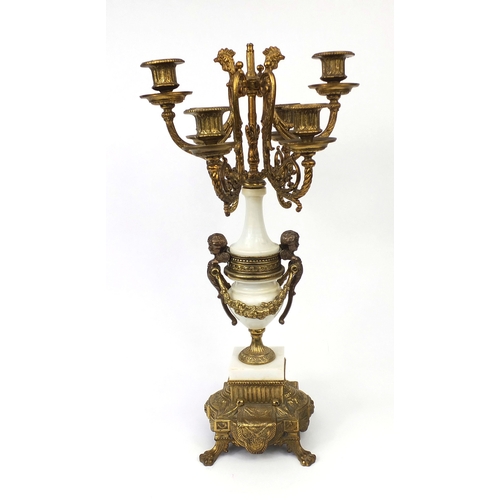 2092 - Ornate gilt brass and white marble six branch  candelabra, with winged cherub mounts, 54cm high