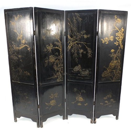 2007 - Oriental folding four section room divider, decorated in relief with pagodas and figures and animals... 