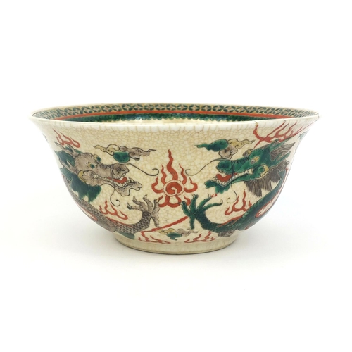 378 - Chinese crackle glazed stoneware bowl, hand painted in the famille verte palette with dragons chasin... 