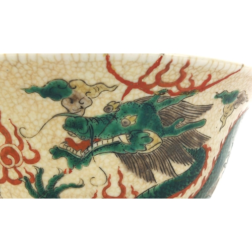 378 - Chinese crackle glazed stoneware bowl, hand painted in the famille verte palette with dragons chasin... 