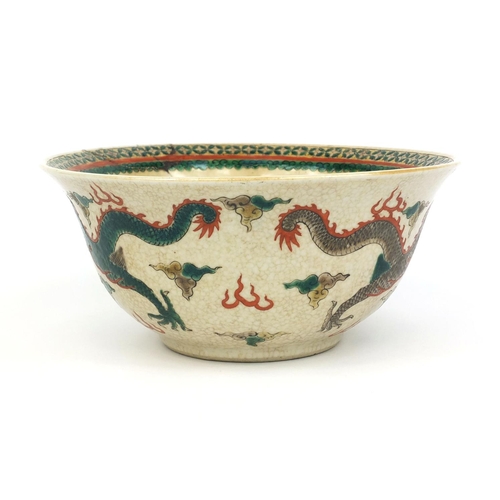 378 - Chinese crackle glazed stoneware bowl, hand painted in the famille verte palette with dragons chasin... 