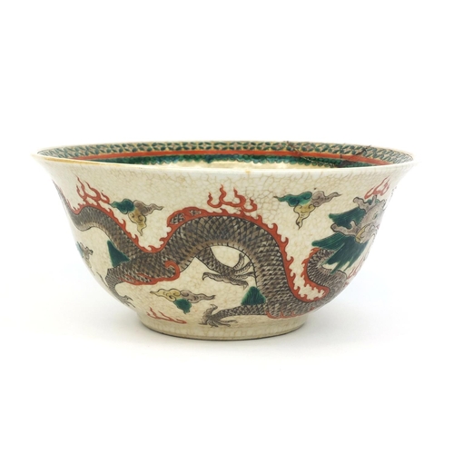 378 - Chinese crackle glazed stoneware bowl, hand painted in the famille verte palette with dragons chasin... 