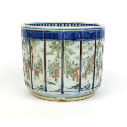 368 - Chinese porcelain brush pot hand painted in famille rose palette, with panels of figures within blue... 