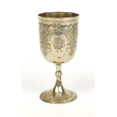 692 - Victorian silver goblet engraved with flowers and swags, W.E London 1874, 13.5cm high, approximate w... 