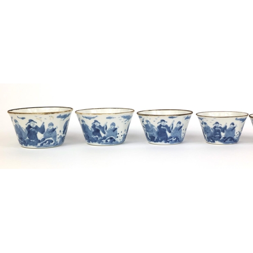 386 - Graduated set of nine Chinese blue and white porcelain bowls, each hand painted with a continuous ba... 