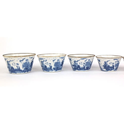 386 - Graduated set of nine Chinese blue and white porcelain bowls, each hand painted with a continuous ba... 