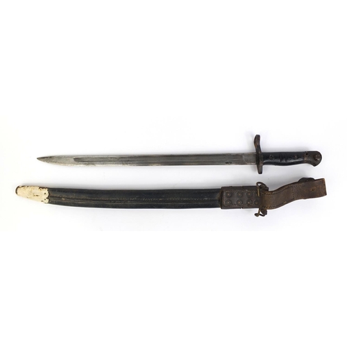 307 - American Military interest Remington 1917 pattern bayonet and scabbard the bayonet with wooden grip,... 