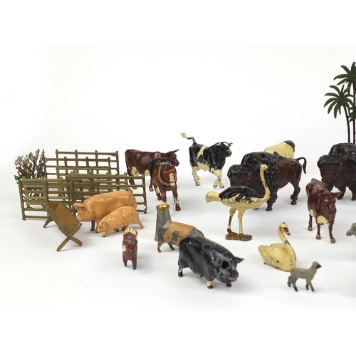 262 - Collection of mostly hand painted lead farm yard animals and accessories predominately Britain's and... 