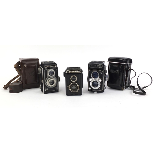 137 - Group of three vintage cameras including a Yashica-24 and a Delmonta example