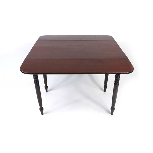 6 - Mahogany Pembroke table fitted with a frieze drawer and raised on turned legs, 74cm high x 51cm wide... 