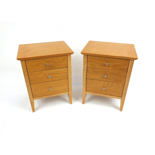 42 - Pair of contemporary light oak three drawer night stands