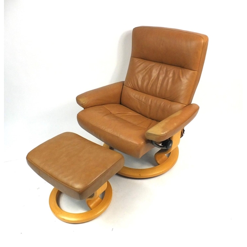 14 - Stressless Ekornes brown leather chair and foot stool