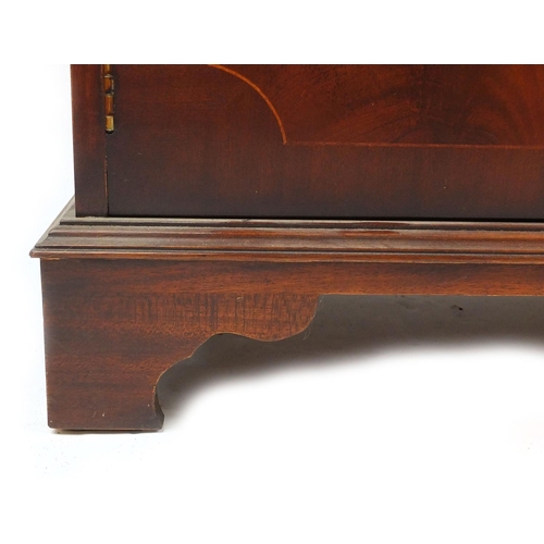 40 - Inlaid mahogany sideboard fitted with three drawers above three cupboard doors, 86cm high x 120cm wi... 