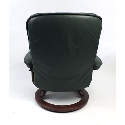 49 - Stressless Ekornes green leather chair and footstool