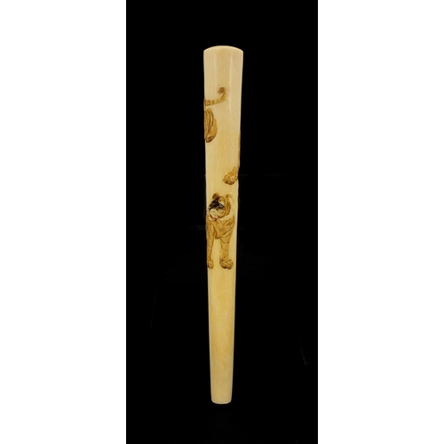 462 - Japanese ivory parasol handle of cylindrical tapering form, carved with two tigers, with attached pa... 