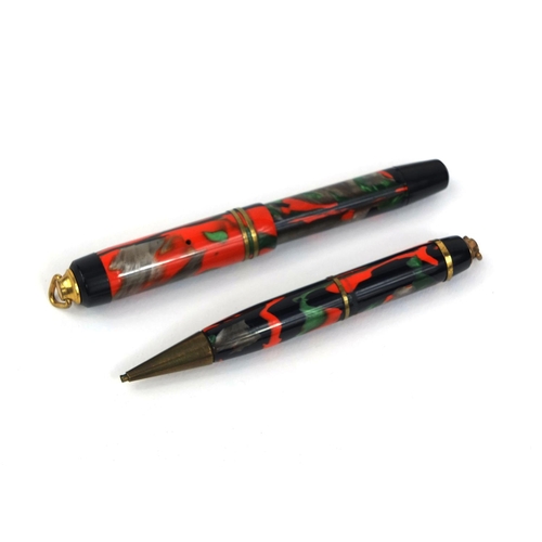 66 - Vintage Chic marbleised miniature fountain pen and propelling pencil housed in a fitted case, the fo... 