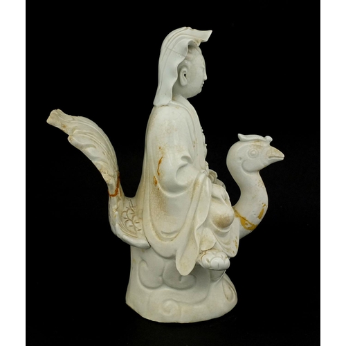 424 - Chinese Blanc de Chine porcelain figure of Guang Ying riding a phoenix, 25cm high