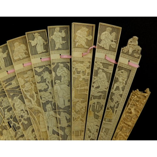 450 - Well detailed Chinese Cantonese ivory fan, profusely pierced and carved with figures, pagodas and fo... 