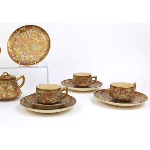 429 - Japanese Satsuma pottery part tea service, profusely hand painted with chrysanthemums, each with cha... 