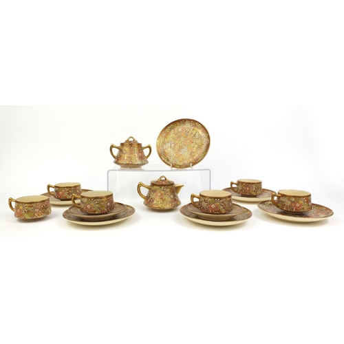 429 - Japanese Satsuma pottery part tea service, profusely hand painted with chrysanthemums, each with cha... 