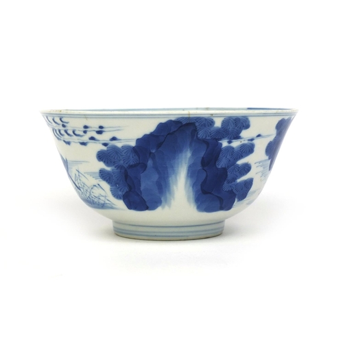 383 - Chinese blue and white porcelain bowl, hand painted with figures in a junk amongst a river landscape... 