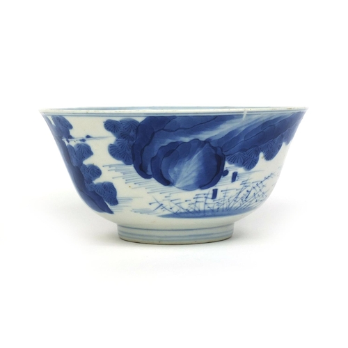 383 - Chinese blue and white porcelain bowl, hand painted with figures in a junk amongst a river landscape... 