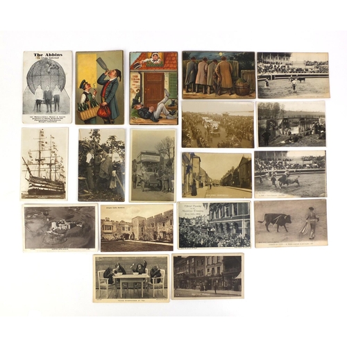 199 - Group of postcards including novelty German sand examples and a black and white photographic example... 