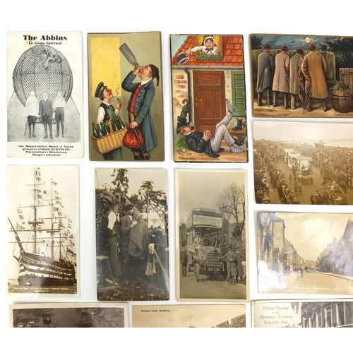 199 - Group of postcards including novelty German sand examples and a black and white photographic example... 