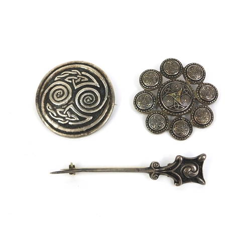 647 - Group of three Scottish Arts & Crafts brooches including two silver Iona examples, the largest 7cm l... 