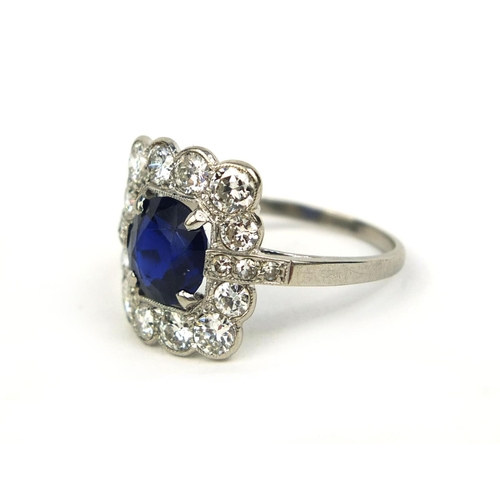 759 - Victorian platinum sapphire and diamond ring set with a central solitaire sapphire surrounded by twe... 